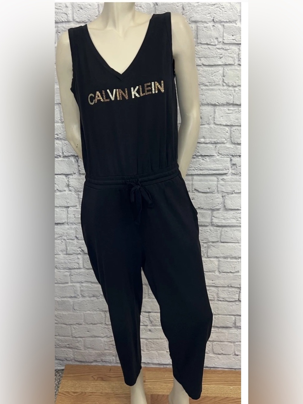 CALVIN KLEIN BLACK SLEEVELESS JUMPSUIT SIZE M